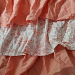 Carousel Designs baby bedding crib skirt coral